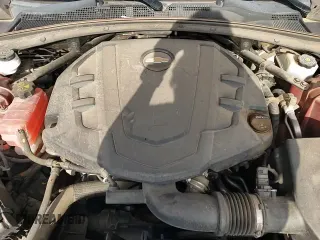 2018 Chevrolet Camaro 2LT z VIN 1G1FD1RS9J0186673, wystawiony jako Copart lot #64681055 z przebiegiem 69 477 mil mil oraz Szkoda całkowita • Salvage title. Historia ofert i sprzedaży dostępna na DreamBid. Obrazek 16.