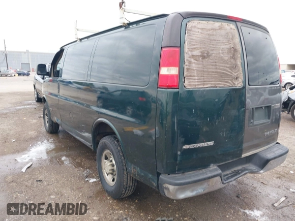 2004 Chevrolet Express Cargo Van with VIN 1GCGG25U541120927, listed as a IAAI auction lot 41279971 with 181,985 mi miles. Bid and sale history available at carsss.com. Image 3.