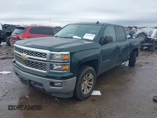 2014 Chevrolet Silverado 1500 LT with VIN 1GCRCREH7EZ340962, listed as a IAAI auction lot 41470994 with 179,326 mi miles and . Bid and sale history available at DreamBid. Image 2.