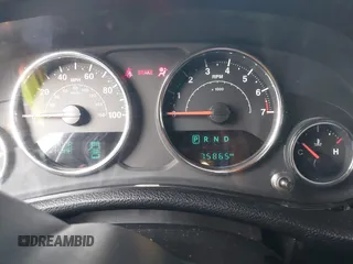 2018 Jeep Wrangler JK Unlimited Sport with VIN 1C4BJWDG5JL858936, listed as a IAAI auction lot 39953617 with 75,865 mi miles. Bid and sale history available at carsss.com. Image 7.