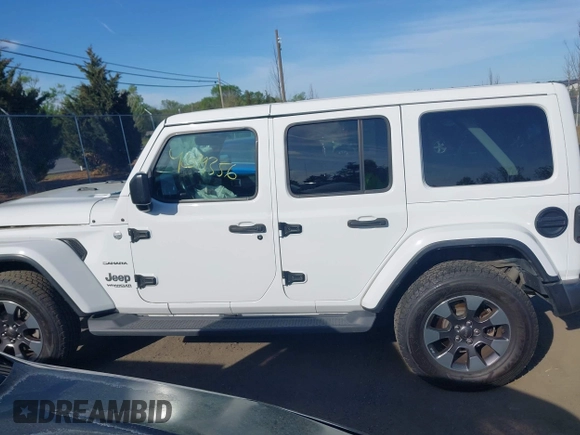 2018 Jeep Wrangler Unlimited Sahara z VIN 1C4HJXEG9JW227829, wystawiony jako IAAI lot #42099356 z przebiegiem 130 259 mil mil oraz . Historia ofert i sprzedaży dostępna na DreamBid. Obrazek 14.