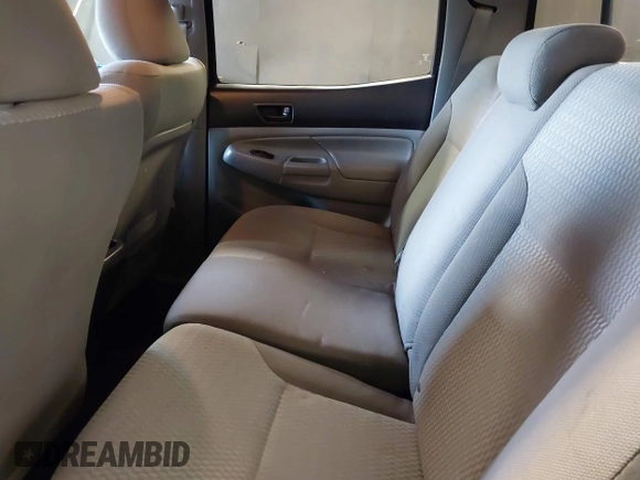 2014 Toyota Tacoma with VIN 3TMLU4EN4EM156933, listed as a IAAI auction lot 41197904 with 128,183 mi miles. Bid and sale history available at carsss.com. Image 8.