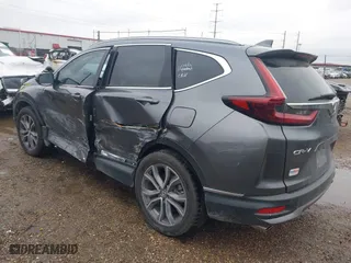 2021 Honda CR-V Touring with VIN 2HKRW2H93MH674995, listed as a IAAI auction lot 41347439 with 58,226 mi miles. Bid and sale history available at carsss.com. Image 3.
