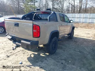 2021 Chevrolet Colorado 4WD ZR2 with VIN 1GCGTEEN9M1140085, listed as a IAAI auction lot 41476667 with 39,087 mi miles. Bid and sale history available at carsss.com. Image 4.