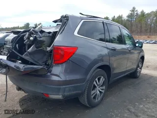 2016 Honda Pilot EX-L with VIN 5FNYF6H55GB023645, listed as a IAAI auction lot 41784613 with 146,724 mi miles. Bid and sale history available at carsss.com. Image 4.