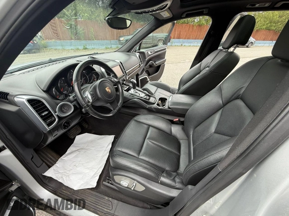 2012 Porsche Cayenne z VIN WP1AA2A23CLA09161, wystawiony jako Copart lot #60892115 z przebiegiem 168 458 mil mil oraz Czysty tytuł • Clean title. Historia ofert i sprzedaży dostępna na DreamBid. Obrazek 5.