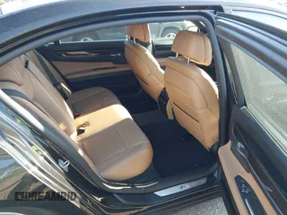 2015 BMW 7 Series 750Li with VIN WBAYE8C50FD781384, listed as a IAAI auction lot 42049829 with 128,087 mi miles and . Bid and sale history available at carsss.com. Image 8.