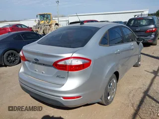 2016 Ford Fiesta S z VIN 3FADP4AJ2GM138776, wystawiony jako IAAI lot #41879870 z przebiegiem 83 769 mil mil oraz . Historia ofert i sprzedaży dostępna na DreamBid. Obrazek 4.