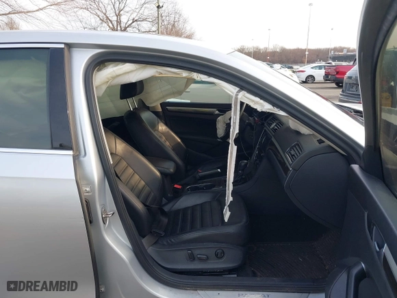 2016 Volkswagen Passat 1.8T SEL with VIN 1VWCT7A3XGC018484, listed as a IAAI auction lot 41763388 with 123,484 mi miles. Bid and sale history available at carsss.com. Image 5.