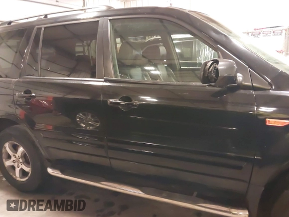 2007 Honda Pilot EX-L with VIN 5FNYF18677B017230, listed as a IAAI auction lot 41727853 with 257,527 mi miles and . Bid and sale history available at DreamBid. Image 14.