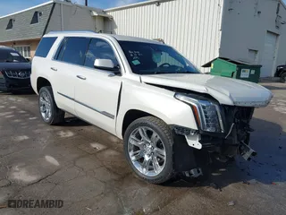 2015 Cadillac Escalade Luxury with VIN 1GYS4BKJ4FR245431, listed as a IAAI auction lot 41525919 with 120,429 mi miles. Bid and sale history available at carsss.com. Image 1.