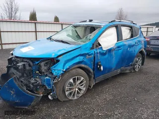 2016 Toyota RAV4 Hybrid XLE with VIN JTMRJREVXGD043129, listed as a IAAI auction lot 41786071 with 97,919 mi miles. Bid and sale history available at carsss.com. Image 17.