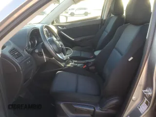 2014 Mazda CX-5 Sport with VIN JM3KE2BE1E0350718, listed as a Copart auction lot 46370205 with 98,065 mi miles and Salvage title. Bid and sale history available at DreamBid. Image 7.