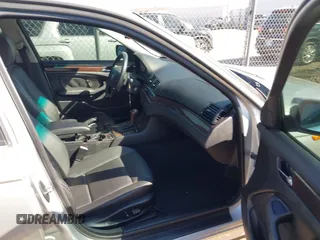 2003 BMW 3 Series 325i with VIN WBAAZ33443PH32847, listed as a IAAI auction lot 41754298 with 165,494 mi miles. Bid and sale history available at carsss.com. Image 5.