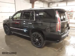2015 Cadillac Escalade Platinum with VIN 1GYS4PKJ9FR745825, listed as a IAAI auction lot 41201715 with 133,363 mi miles. Bid and sale history available at carsss.com. Image 3.