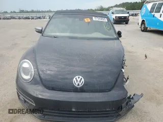 2014 Volkswagen Beetle 1.8T w/Premium z VIN 3VW517AT6EM816698, wystawiony jako Copart lot #57344055 z przebiegiem 52 782 mil mil oraz Szkody całkowita. Historia ofert i sprzedaży dostępna na DreamBid. Obrazek 5.