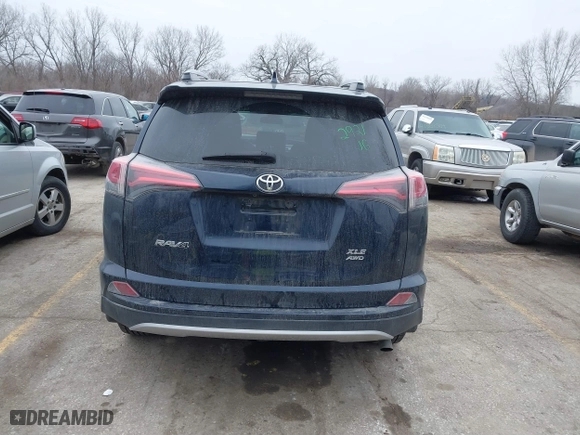 2017 Toyota RAV4 XLE with VIN JTMRFREV6HJ137349, listed as a IAAI auction lot 41542599 with 60,868 mi miles. Bid and sale history available at carsss.com. Image 16.