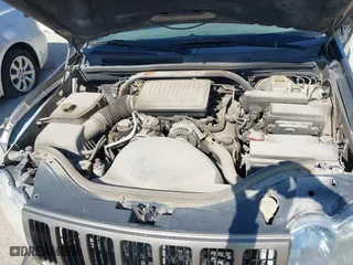 2005 Jeep Grand Cherokee Laredo with VIN 1J4HR48N35C647637, listed as a IAAI auction lot 38514345 with 167,342 mi miles. Bid and sale history available at carsss.com. Image 10.