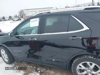 2021 Chevrolet Equinox Premier с VIN 2GNAXNEV9M6150369, выставлен на аукционе IAAI как лот 41315549 с пробегом 57 614 миль миль и . История ставок и продаж доступна на DreamBid. Изображение 14.