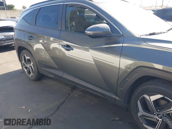 2022 Hyundai Tucson SEL z VIN 5NMJF3AE6NH133724, wystawiony jako IAAI lot #42309502 z przebiegiem 49 156 mil mil oraz . Historia ofert i sprzedaży dostępna na DreamBid. Obrazek 13.