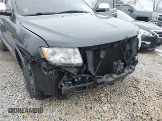 2011 Jeep Grand Cherokee Overland with VIN 1J4RR6GT5BC629412, listed as a IAAI auction lot 41741813 with 156,122 mi miles and . Bid and sale history available at DreamBid. Image 6.