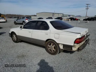1995 Lexus ES 300 with VIN JT8GK13T8S0107061, listed as a Copart auction lot 49986875 with 306,343 mi miles and Salvage Title. Bid and sale history available at DreamBid. Image 2.