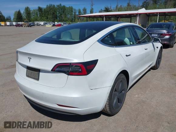 2020 Tesla Model 3 Standard Range Plus z VIN 5YJ3E1EA5LF615350, wystawiony jako IAAI lot #42194363 z przebiegiem 123 327 mil mil oraz . Historia ofert i sprzedaży dostępna na DreamBid. Obrazek 4.