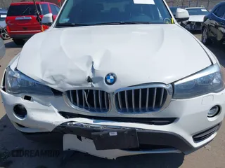 2017 BMW X3 xDrive28i z VIN 5UXWX9C52H0D96737, wystawiony jako IAAI lot #42094100 z przebiegiem 86 641 mil mil oraz . Historia ofert i sprzedaży dostępna na DreamBid. Obrazek 6.