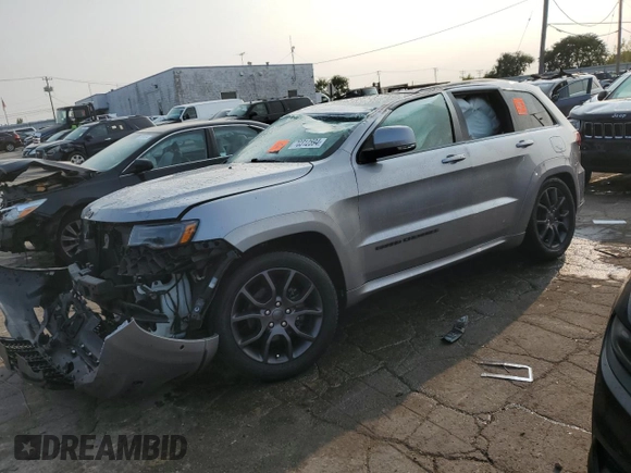 2020 Jeep Grand Cherokee Overland with VIN 1C4RJFCG3LC251579, listed as a Copart auction lot 70312594 with 59,656 mi miles and Salvage Title. Bid and sale history available at carsss.com. Image 1.
