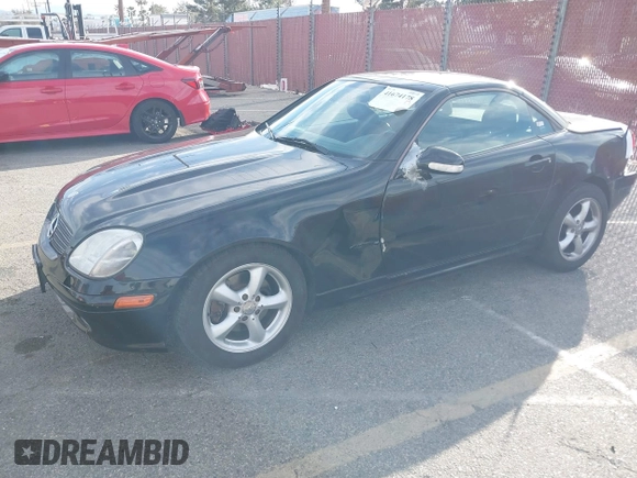 2003 Mercedes-Benz SLK 320 with VIN WDBKK65F43F281612, listed as a IAAI auction lot 41674178 with 153,517 mi miles and . Bid and sale history available at DreamBid. Image 2.
