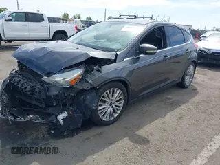 2018 Ford Focus Titanium with VIN 1FADP3N23JL241453, listed as a IAAI auction lot 42025190 with 90,174 mi miles and . Bid and sale history available at DreamBid. Image 17.