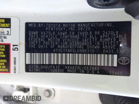 2020 Toyota Camry LE with VIN 4T1C11AKXLU986310, listed as a IAAI auction lot 40977100 with 108,208 mi miles and . Bid and sale history available at DreamBid. Image 9.