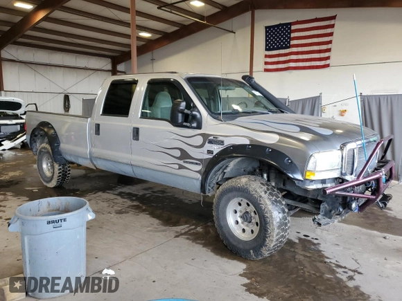 2001 Ford F-250 XL with VIN 1FTNW21F21EB83957, listed as a Copart auction lot 61602715 with 205,738 mi miles and Salvage title. Bid and sale history available at DreamBid. Image 4.
