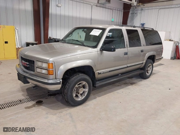 1999 GMC Suburban with VIN 3GKGK26J0XG537434, listed as a IAAI auction lot 41787267 with NaN miles. Bid and sale history available at carsss.com. Image 2.