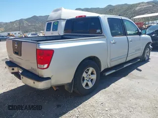 2007 Nissan Titan XE with VIN 1N6AA07A87N214499, listed as a IAAI auction lot 41965882 with 140,693 mi miles and . Bid and sale history available at DreamBid. Image 4.