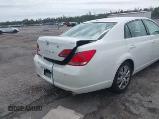 2010 Toyota Avalon XL with VIN 4T1BK3DB8AU354533, listed as a IAAI auction lot 41802797 with 117,956 mi miles and . Bid and sale history available at carsss.com. Image 18.