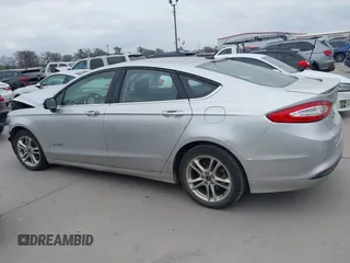 2016 Ford Fusion SE Hybrid with VIN 3FA6P0LU2GR340755, listed as a IAAI auction lot 41673932 with 191,650 mi miles. Bid and sale history available at carsss.com. Image 15.