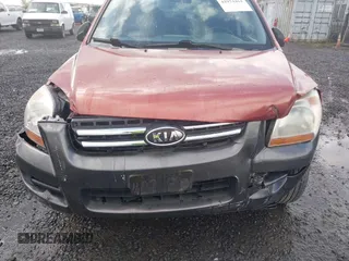 2006 Kia Sportage LX with VIN KNDJE723167159809, listed as a IAAI auction lot 41974464 with 130,822 mi miles and . Bid and sale history available at DreamBid. Image 6.