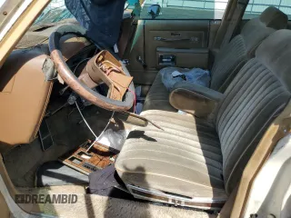 1985 Oldsmobile Delta Royale z VIN 1G3BN69Y8FY384593, wystawiony jako Copart lot #62885694 z przebiegiem Nie podano mil oraz Szkody całkowita. Historia ofert i sprzedaży dostępna na DreamBid. Obrazek 7.