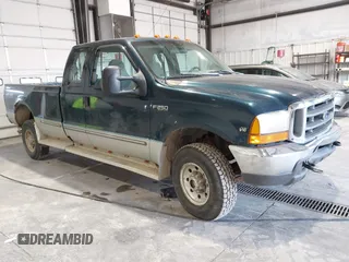 1999 Ford Super Duty F-250 XL with VIN 1FTNX21S1XEA96540, listed as a IAAI auction lot 41631269 with 189,883 mi miles. Bid and sale history available at carsss.com. Image 1.