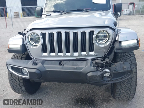2021 Jeep Wrangler Unlimited Sahara with VIN 1C4HJXEN9MW637288, listed as a IAAI auction lot 42553459 with 39,362 mi miles and . Bid and sale history available at DreamBid. Image 6.