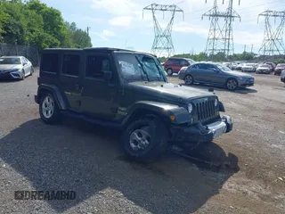 2015 Jeep Wrangler Unlimited Altitude with VIN 1C4HJWEG0FL752152, listed as a IAAI auction lot 42311043 with 112,379 mi miles and . Bid and sale history available at DreamBid. Image 1.