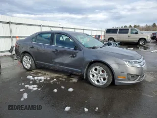 2011 Ford Fusion SE with VIN 3FAHP0HA8BR216084, listed as a Copart auction lot 50295375 with 122,062 mi miles and Salvage Title. Bid and sale history available at DreamBid. Image 4.
