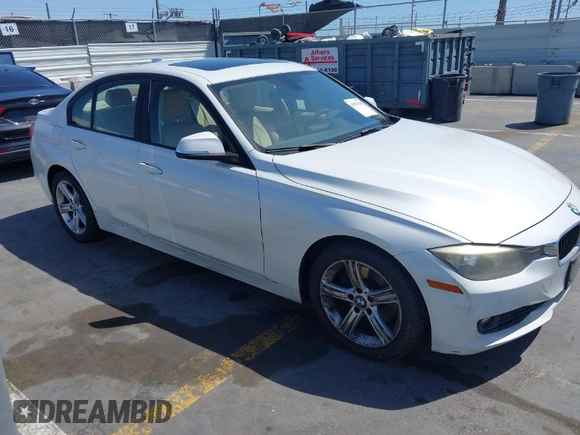 2013 BMW 3 Series 328i with VIN WBA3A5C51DF352812, listed as a IAAI auction lot 41974158 with 176,951 mi miles. Bid and sale history available at carsss.com. Image 1.