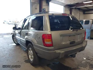 2001 Jeep Grand Cherokee Laredo with VIN 1J4GW48S01C732942, listed as a IAAI auction lot 41988918 with 205,752 mi miles. Bid and sale history available at carsss.com. Image 3.