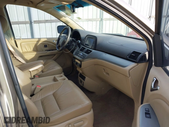 2010 Honda Odyssey Touring with VIN 5FNRL3H9XAB094779, listed as a IAAI auction lot 40412812 with 145,533 mi miles. Bid and sale history available at carsss.com. Image 5.