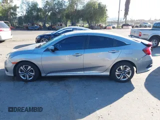 2016 Honda Civic Sedan LX with VIN 19XFC2F50GE027409, listed as a IAAI auction lot 41678211 with 116,498 mi miles. Bid and sale history available at carsss.com. Image 14.