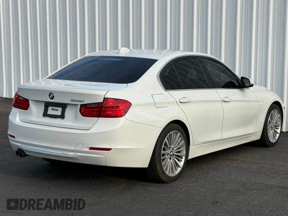 2013 BMW 3 Series 328i with VIN WBA3C1C59DF437433, listed as a Copart auction lot 65803415 with 103,062 mi miles and Clean title. Bid and sale history available at DreamBid. Image 4.