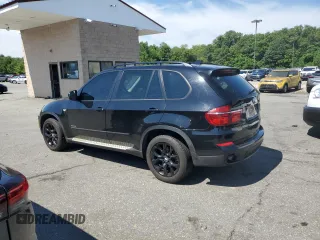 2012 BMW X5 35i with VIN 5UXZV4C54CL752079, listed as a Copart auction lot 62147515 with 147,244 mi miles and Clean title. Bid and sale history available at DreamBid. Image 2.