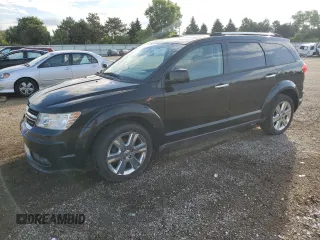 2011 Dodge Journey Crew with VIN 3D4PG3FG5BT521689, listed as a Copart auction lot 62148065 with 105,101 mi miles and Salvage title. Bid and sale history available at DreamBid. Image 1.